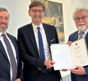 das Bild zeigt: Präsident des Oberlandesgerichts Koblenz Thomas Henrichs, Präsident des Landgerichts Mainz Tobias Eisert und Justizminister Herbert Mertin